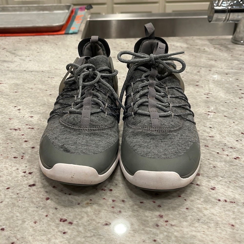 Grey Nikes - not sure style. Size 8.5.